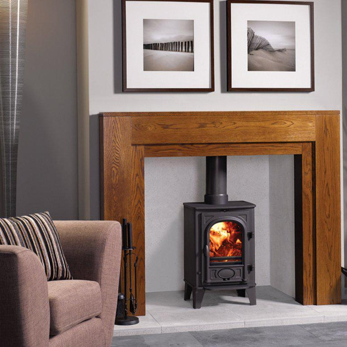 Stovax Stockton 4 Matt Black multi-fuel stove with timber mantel