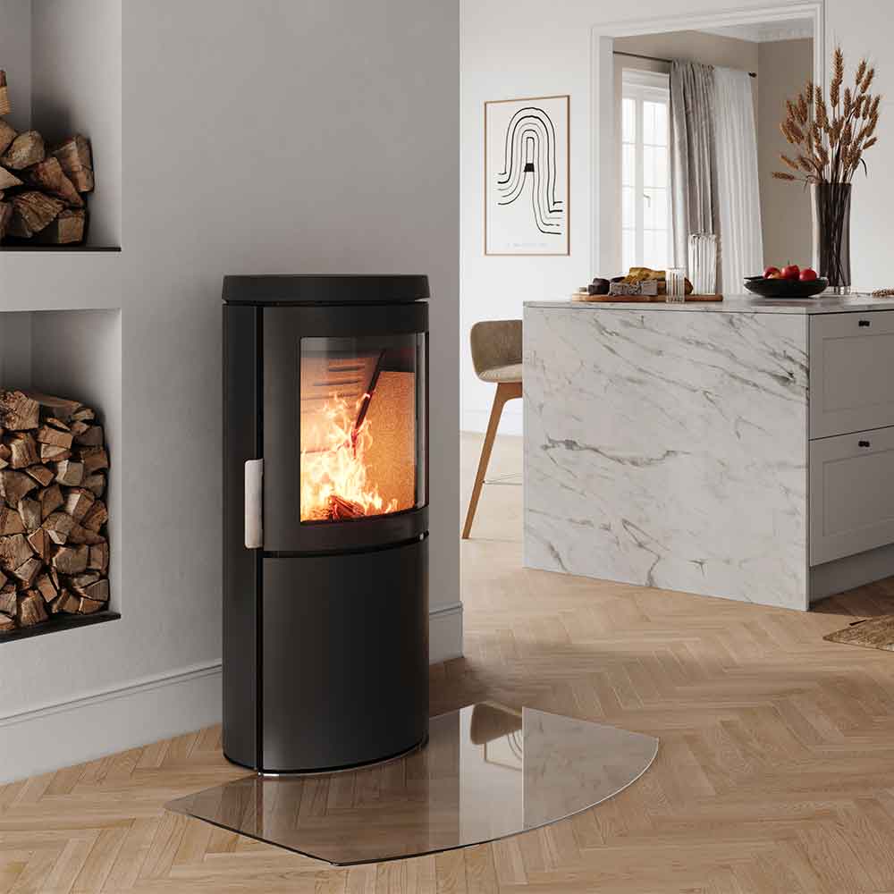 HWAM 3120c wood-burning stove with Classic door in a room setting
