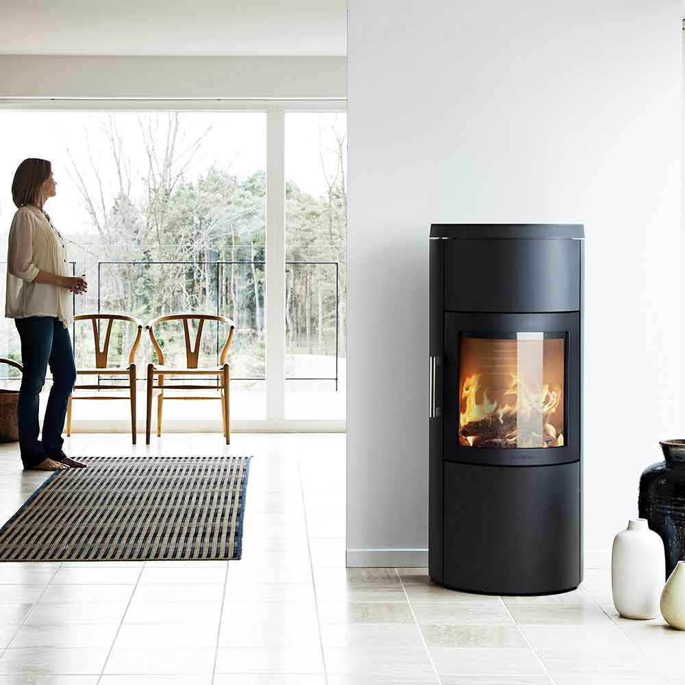 HWAM 3520m wood-burning stove in a bright living room