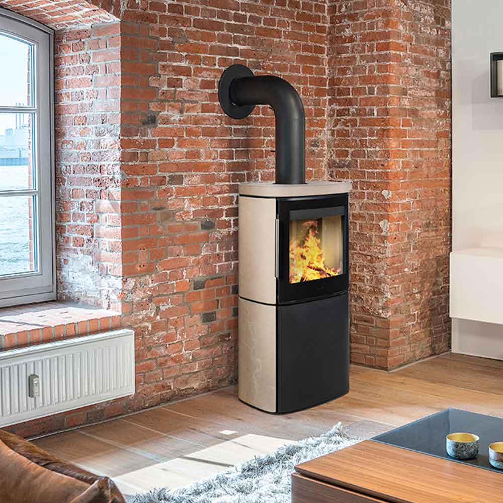 HWAM 4640m wood-burning stove in a room setting