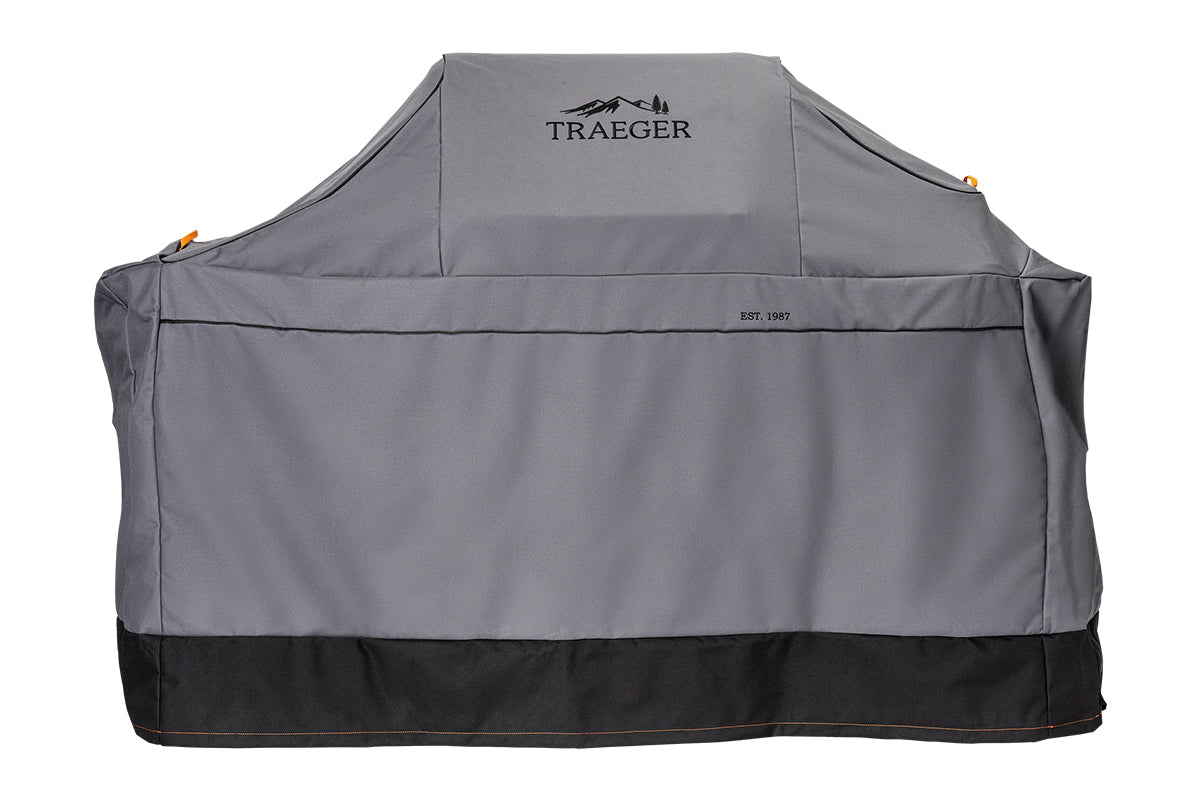 Grey Traeger Ironwood full-length grill cover with a black lower edge, front view