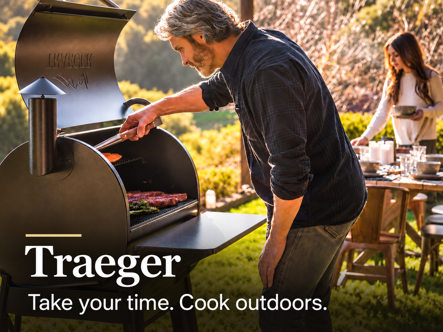 Traeger. Take your time. Cook outdoors. Cooking on a Traeger grill in a garden
