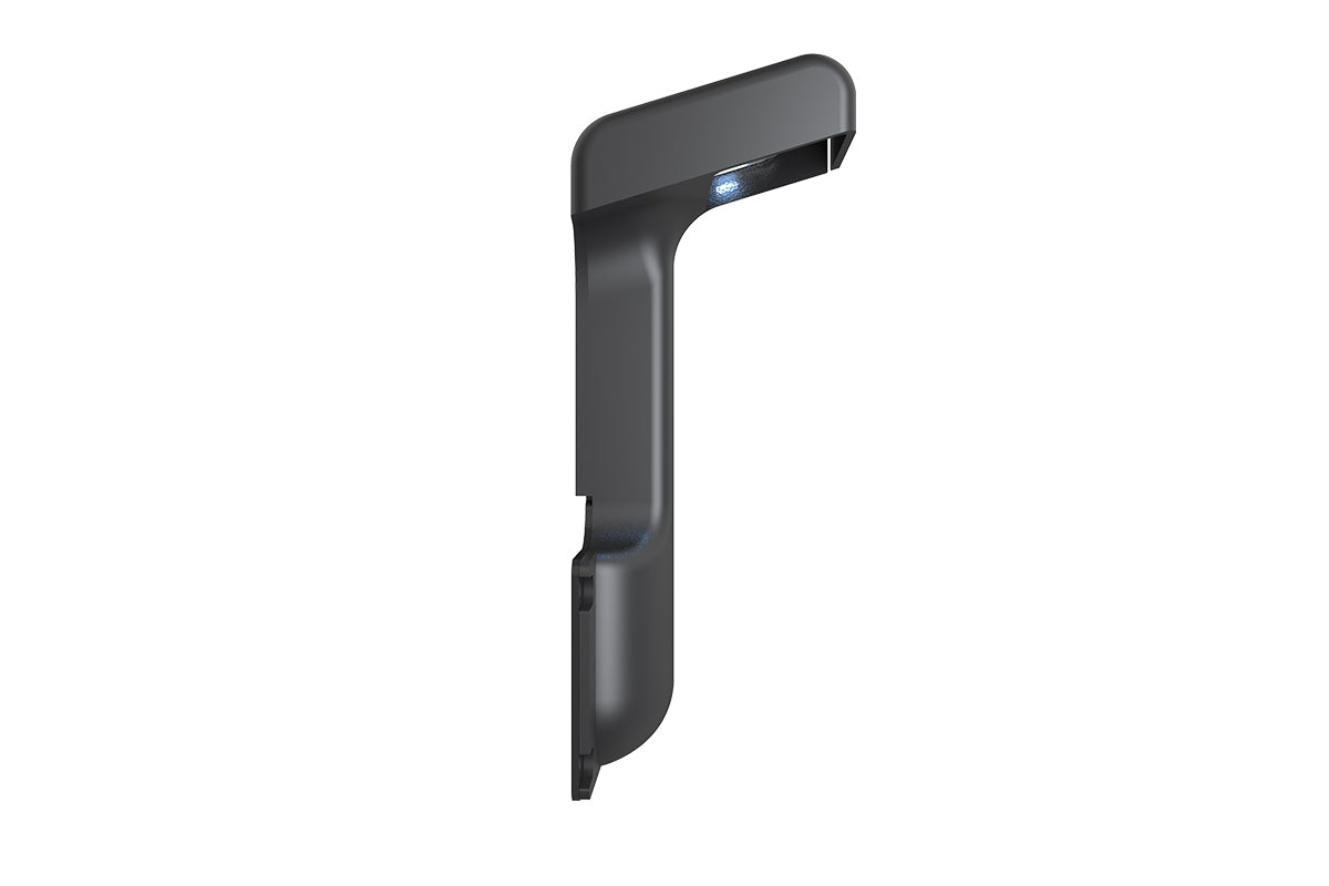 Side view of the black Traeger Pellet Sensor with its light illuminated