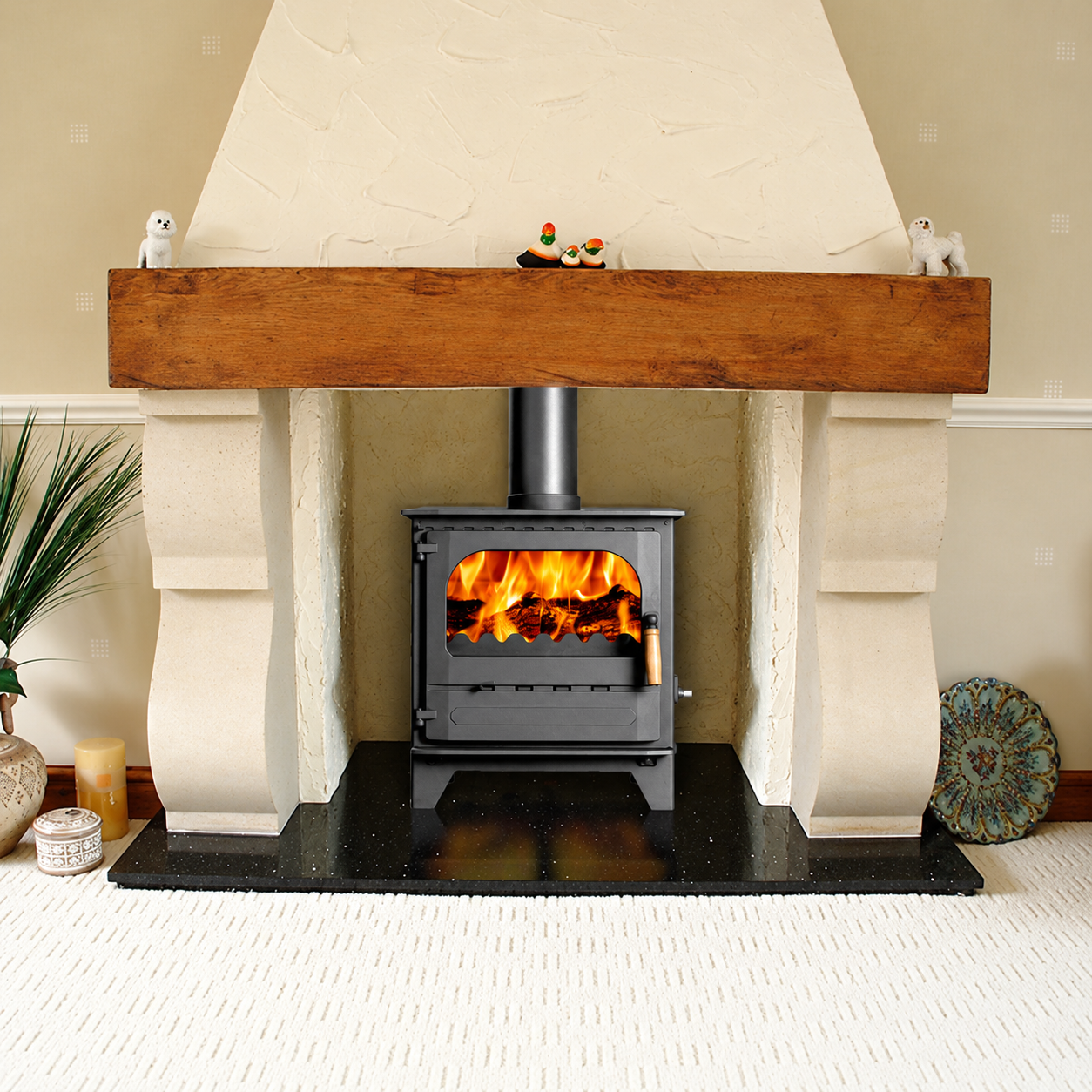 Dunsley Highlander 8 Enviroburn Solo with a wood handle burning logs beneath a timber mantel