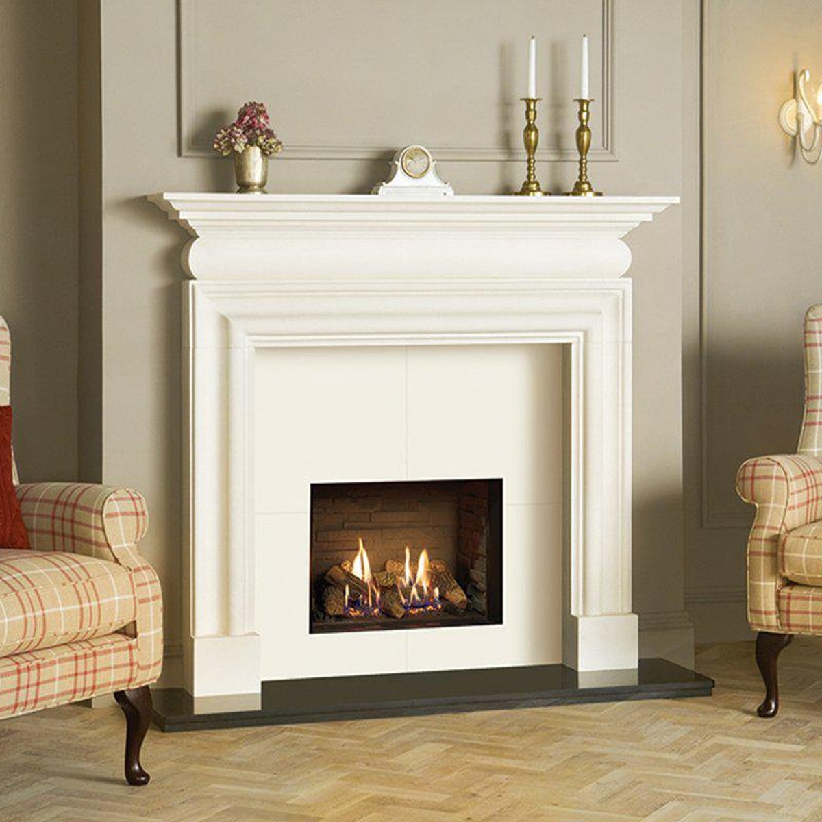 Gazco Riva2 500 Edge gas fire with Ledgestone lining and a white mantel