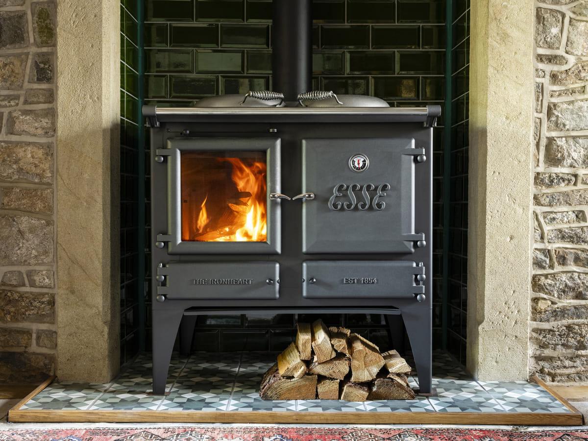 ESSE Ironheart wood-fired cook stove installed in a furnished room