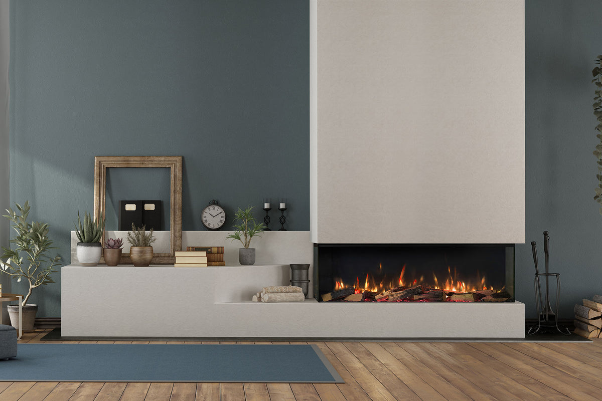 Solus VS130 electric fire with glass sides above a pale stepped hearth against a blue wall