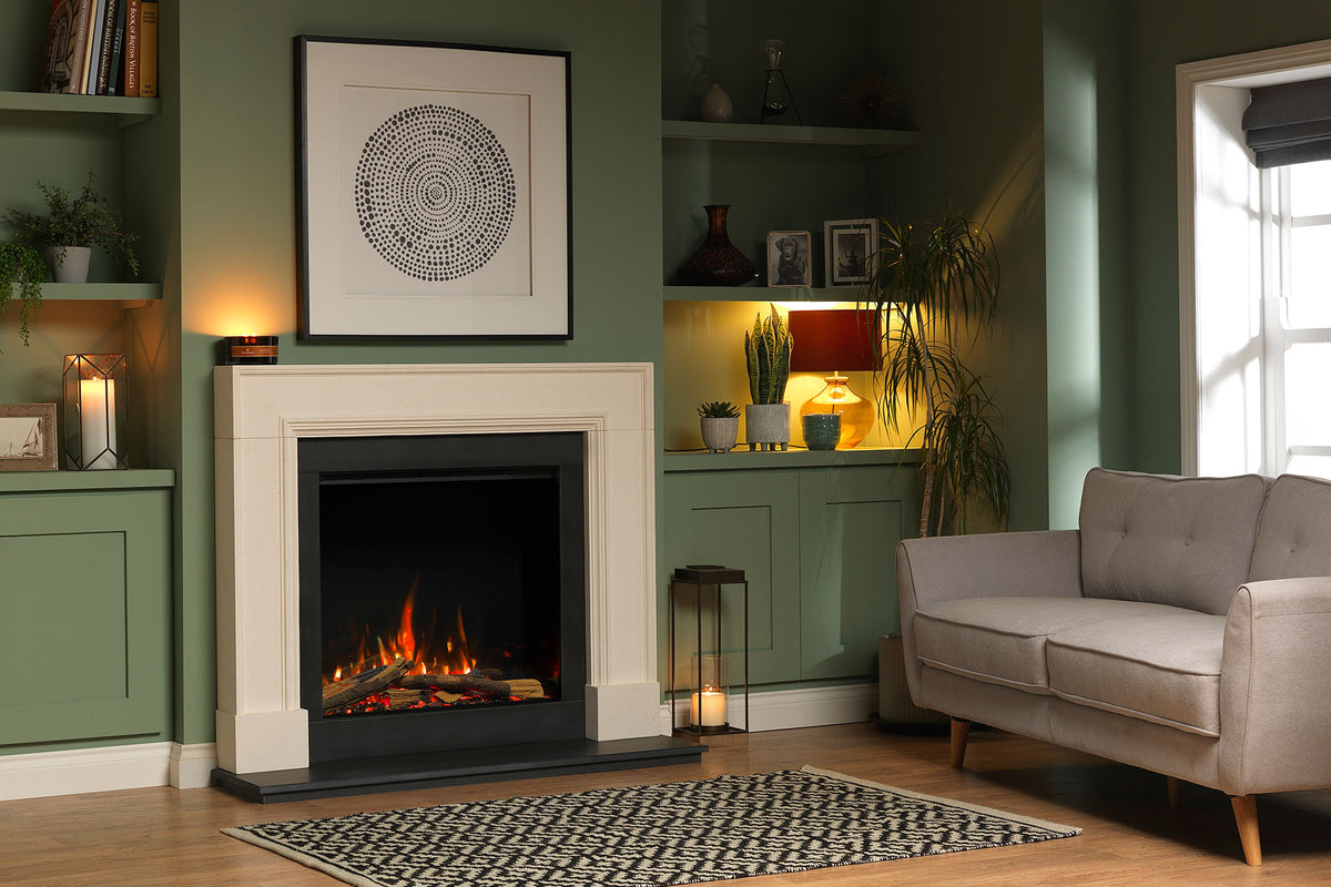 Solus VS75 electric fire in a cream fireplace surround against a green living room wall