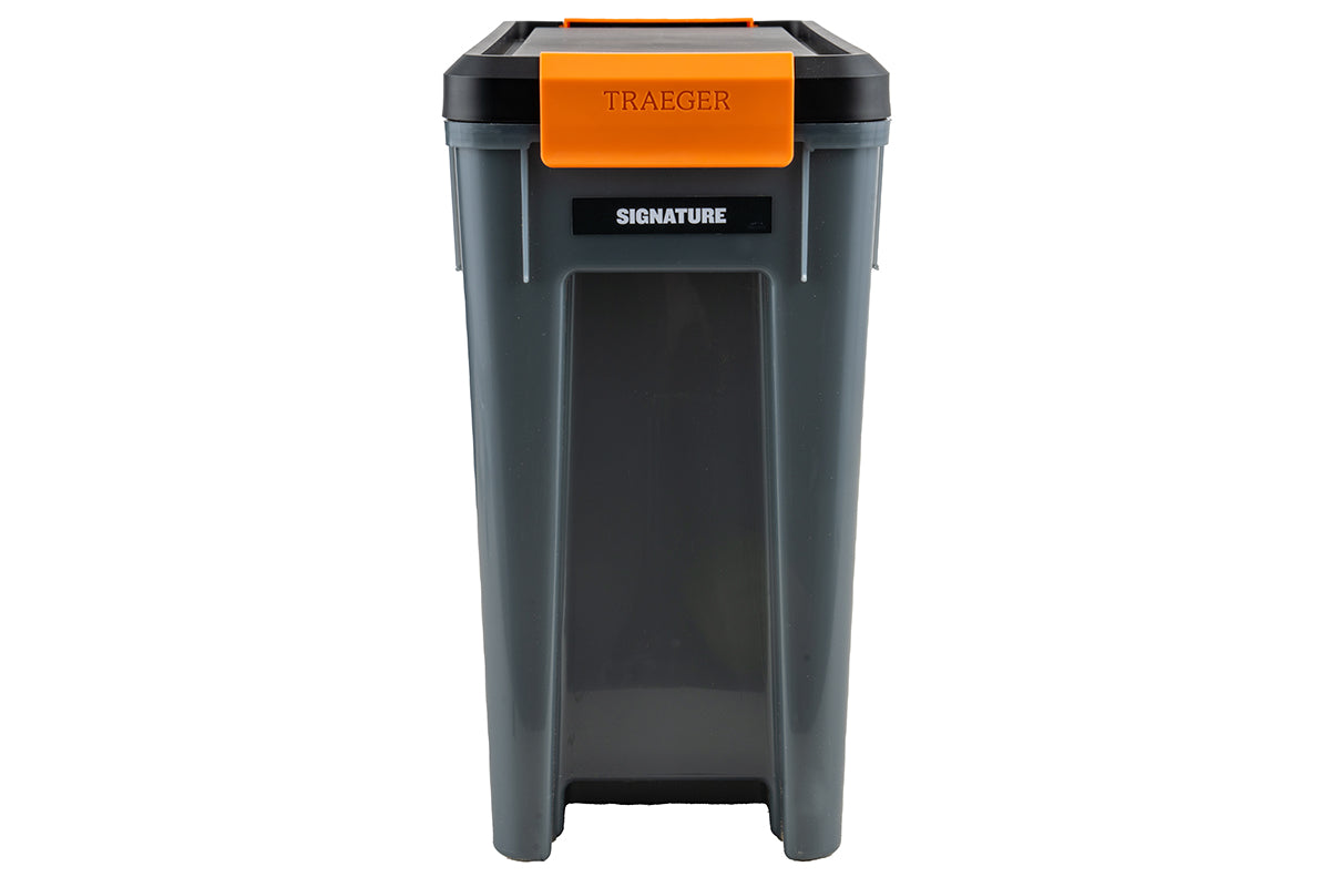 End view of the Traeger StayDRY pellet bin with a Signature label beneath its orange latch
