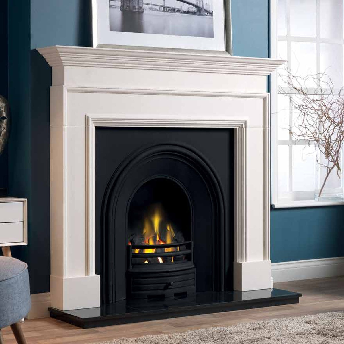 Penman Cortese Agean limestone fireplace mantel, shown in a room setting