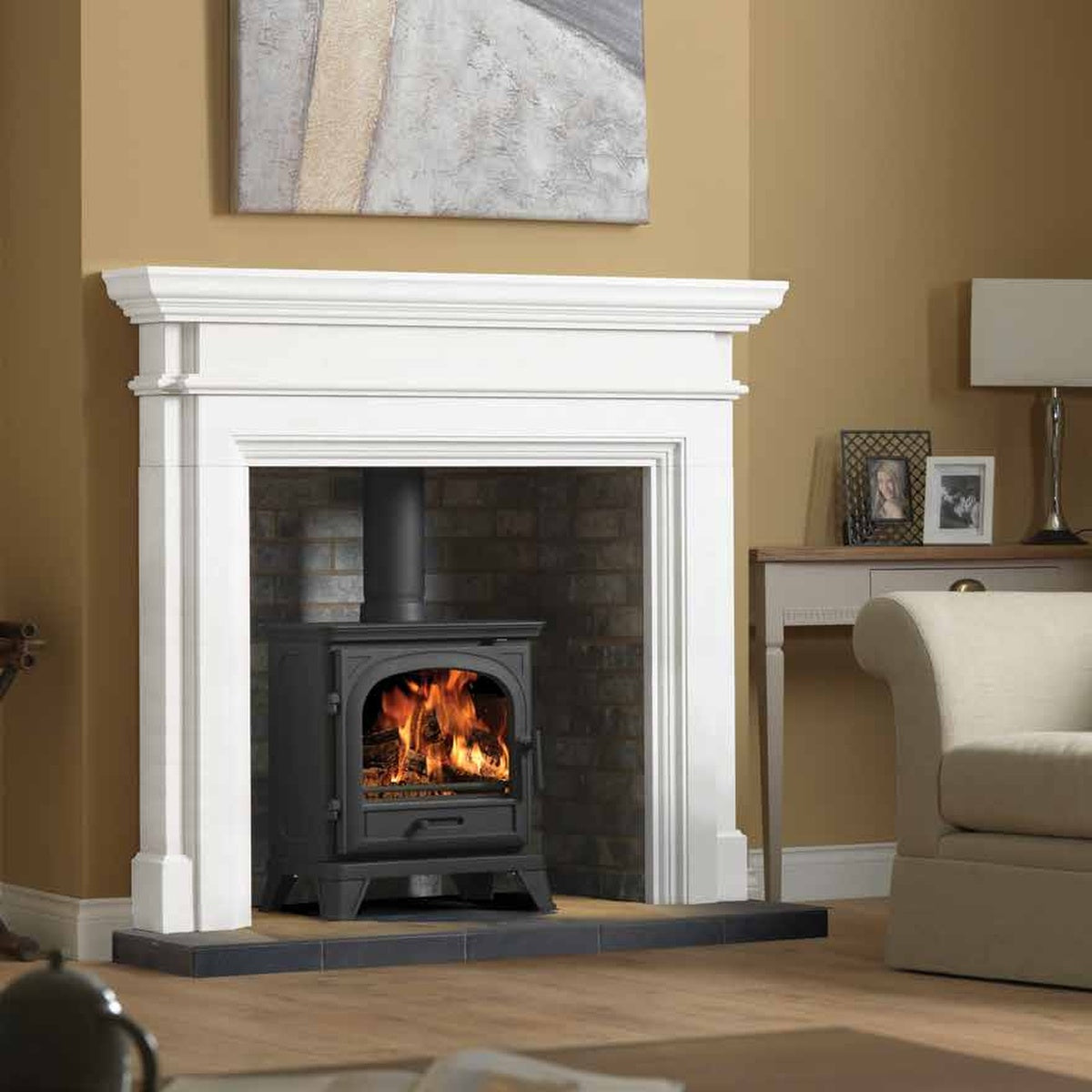 Penman Teramo Agean limestone fireplace mantel, shown in a room setting