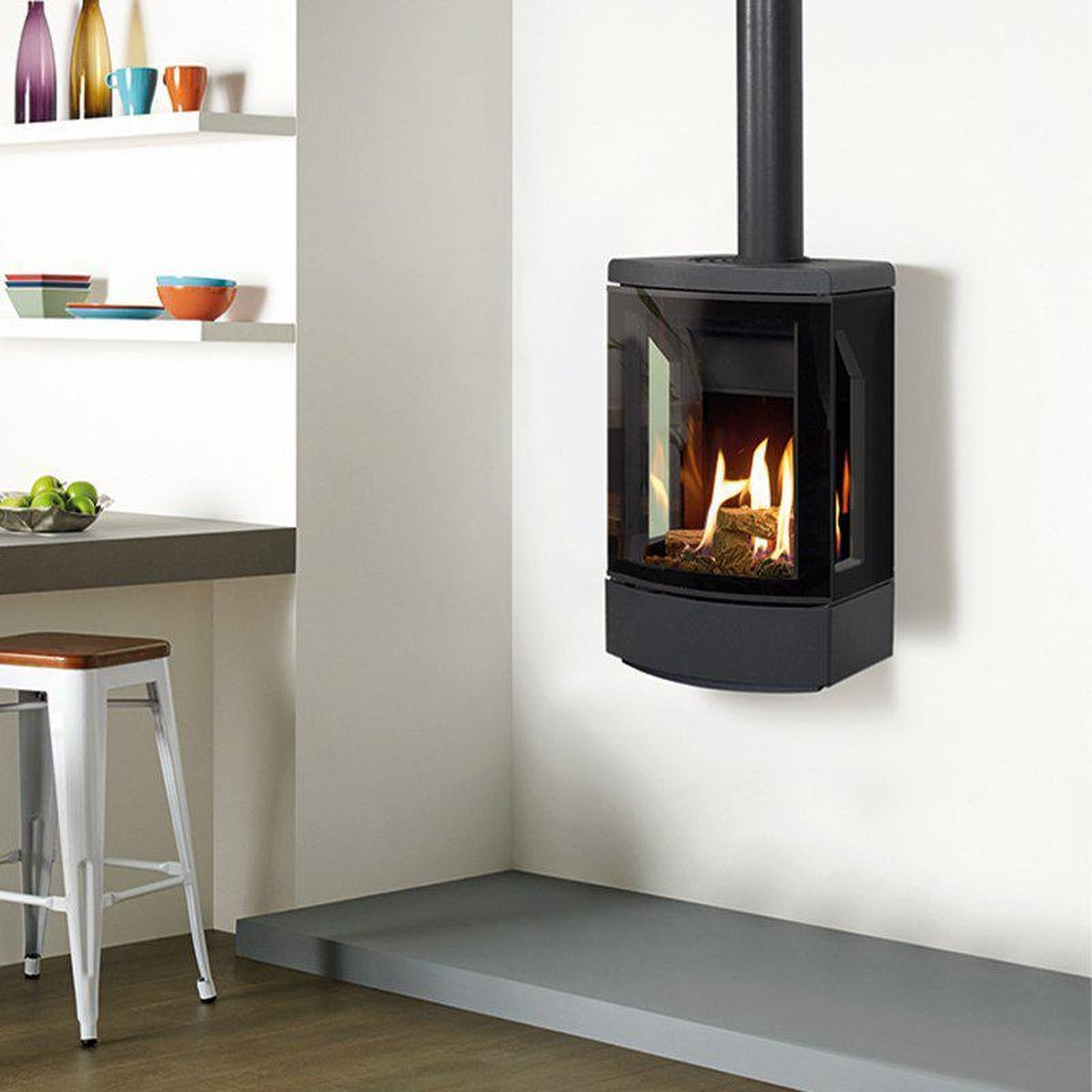 Gazco Loft wall-mounted gas stove beside a breakfast bar
