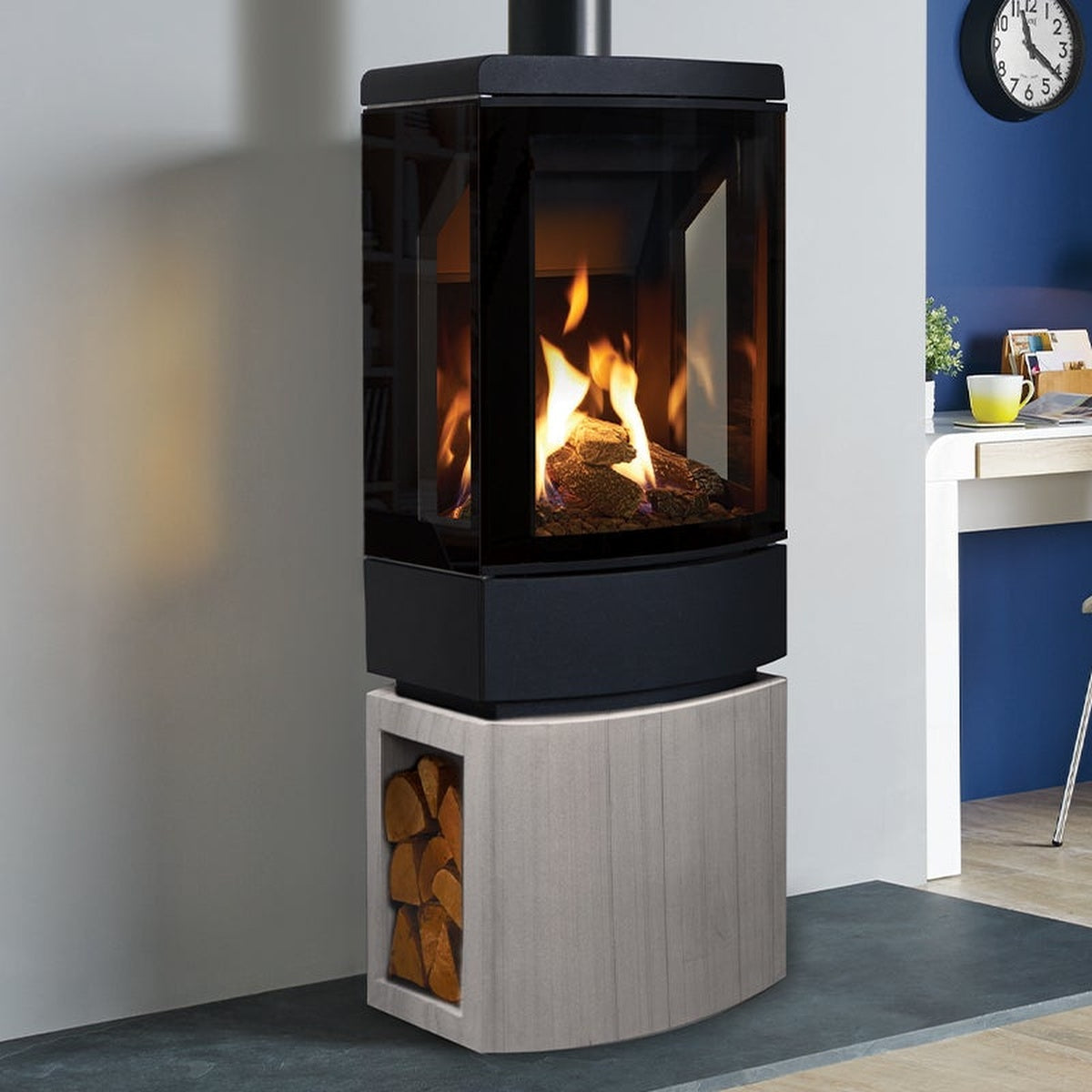 Gazco Loft gas stove with a woodgrain stone log-store base
