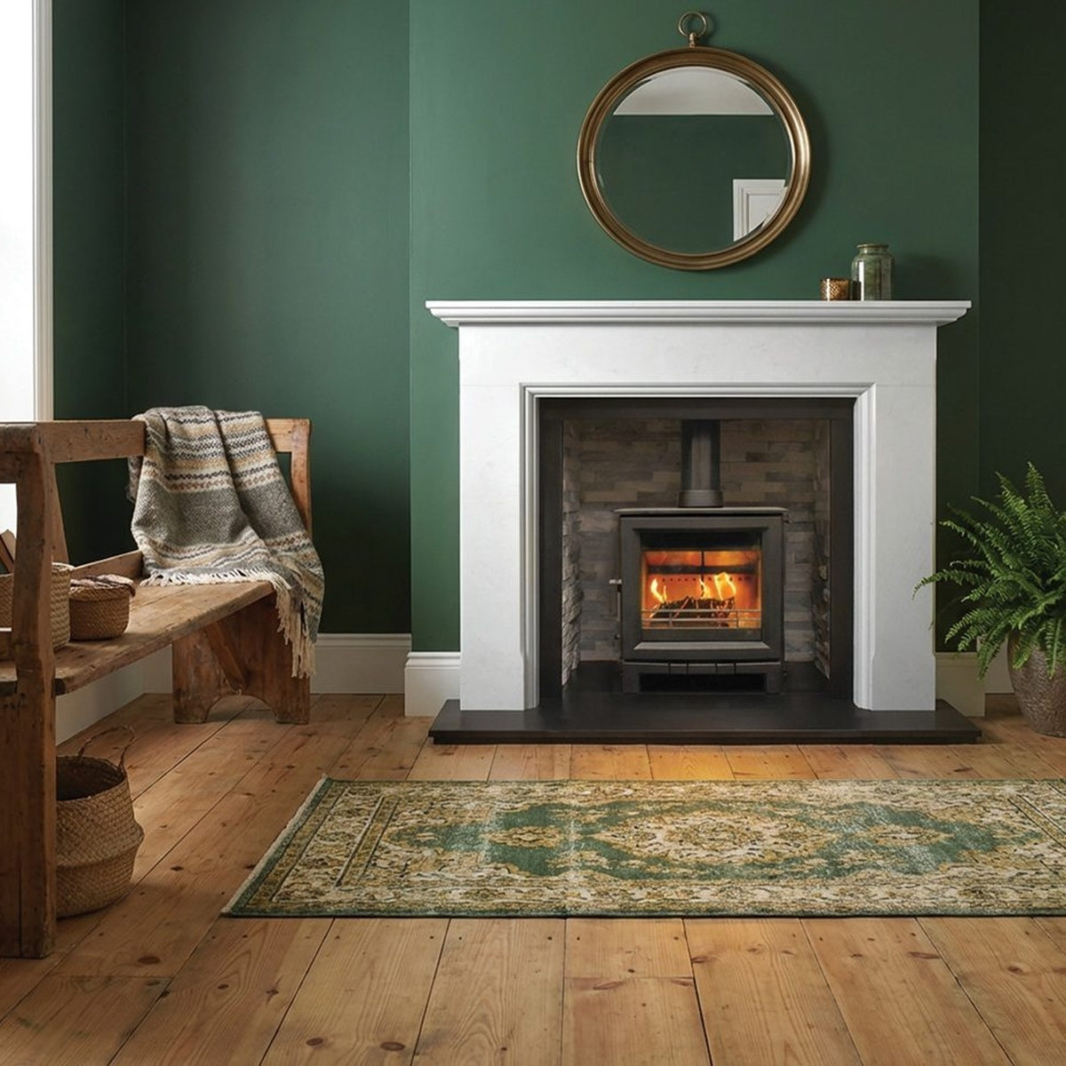 Mourne Meelbeg 58-inch New Carrara mantel in a room setting, shown with a separately supplied stove and hearth