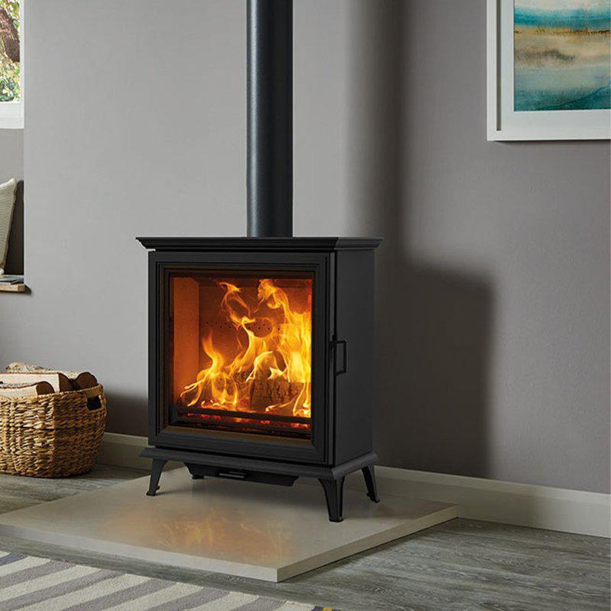 Stovax Sheraton 5 Wide on a hearth beside a window seat
