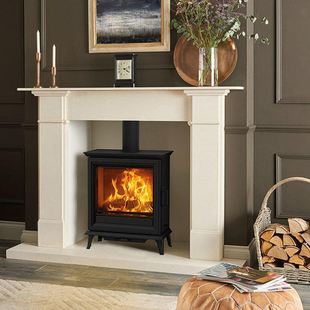 Stovax Sheraton 5 Wide with a pale stone mantel in a dark living room