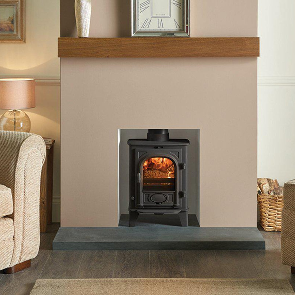Stovax Stockton 3 Matt Black multi-fuel stove beneath a timber beam