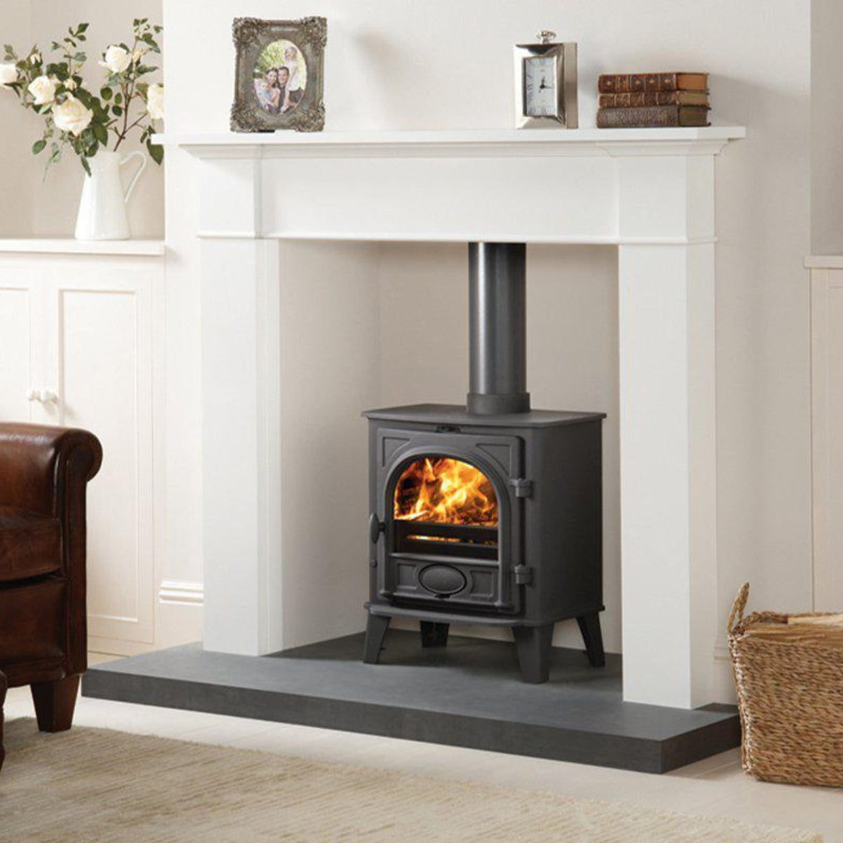 Stovax Stockton 5 Matt Black multi-fuel stove with white limestone mantel