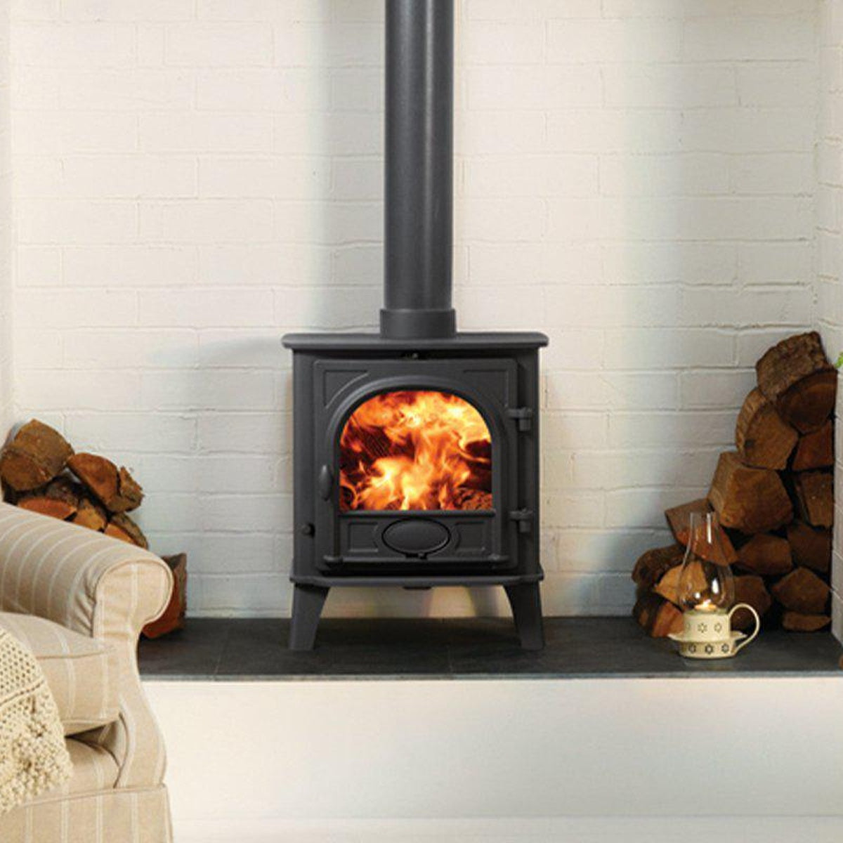 Stovax Stockton 5 Matt Black multi-fuel stove against white tiles