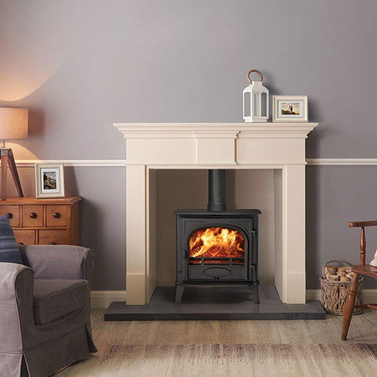 Stovax Stockton 5 Wide Matt Black single-door fixed-grate multi-fuel stove with white mantel