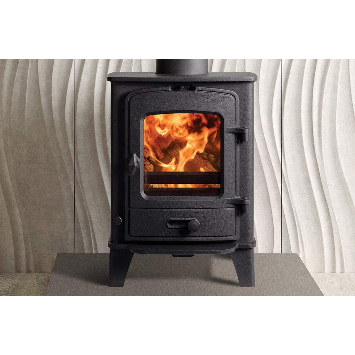Stovax County 3 stove shown close up on a hearth