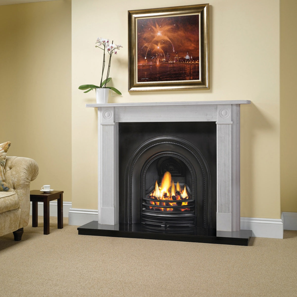 Stovax Georgian Roundel natural limestone mantel shown with a separately supplied decorative arched insert and hearth