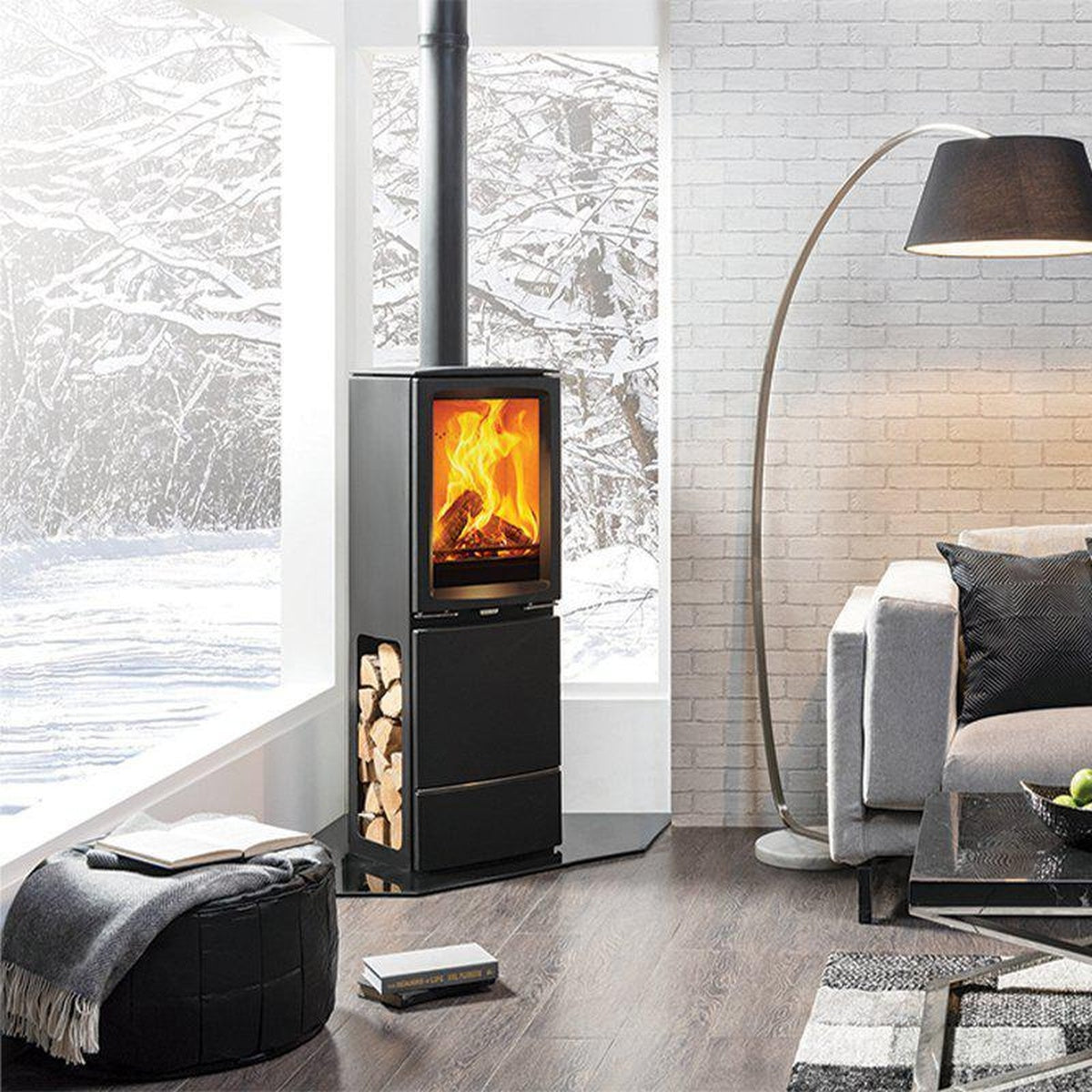 Stovax Vogue Midi T Highline wood and multi-fuel stove beside a window in a grey living room