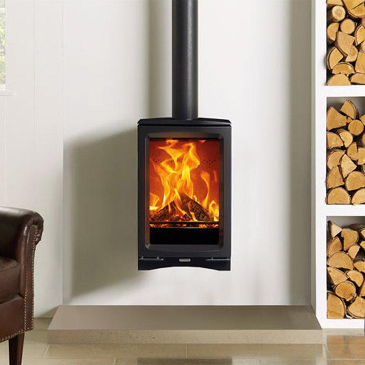 Stovax Vogue Midi T Wall Hung stove without plinth beside built-in log storage