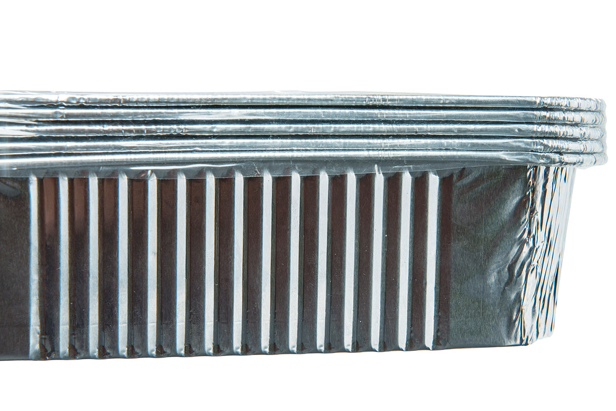 Side detail of stacked Traeger Timberline grease pan liners showing the ribbed foil walls
