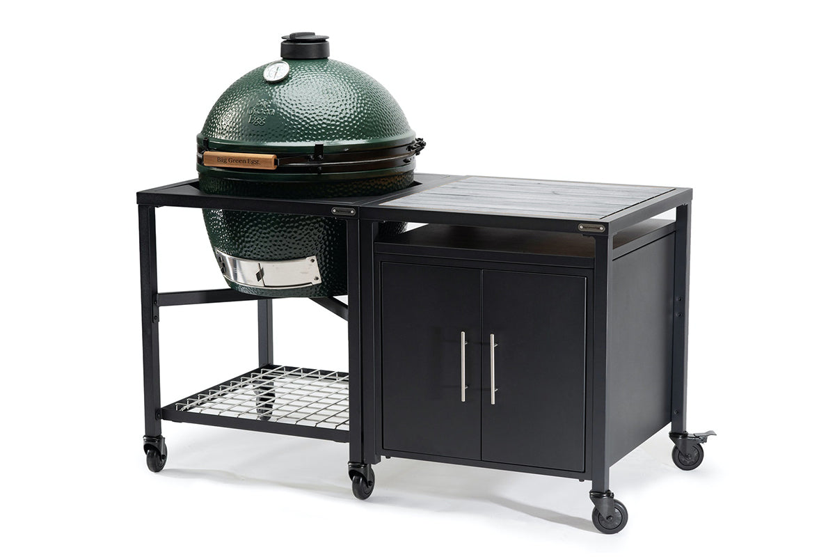 Big Green Egg in a wheeled Modular Nest beside a two-door expansion cabinet with a grey acacia worktop