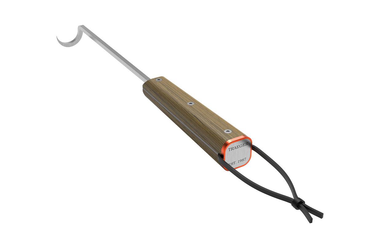 Angled view of the Traeger BBQ Pig Tail with wooden handle, branded end cap and curved metal hook