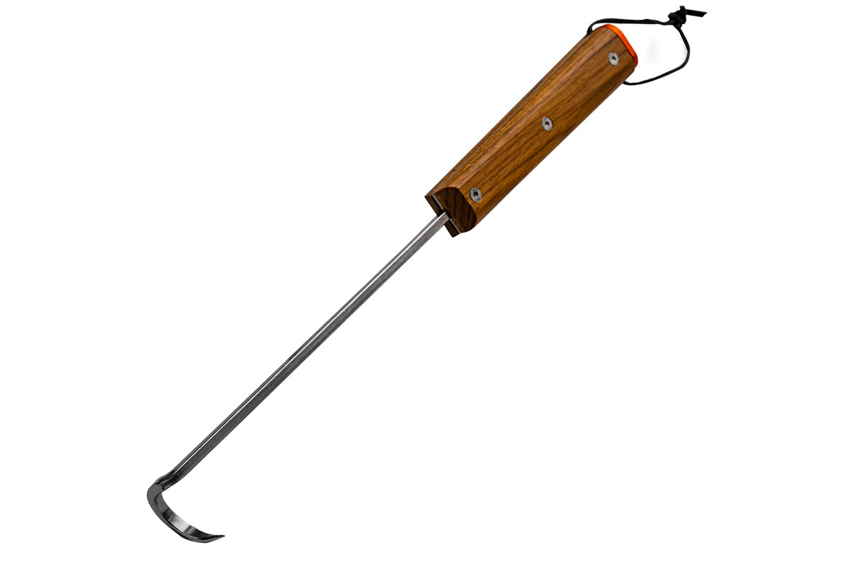 Traeger BBQ Pig Tail showing the wooden handle and long metal shaft ending in a curved hook