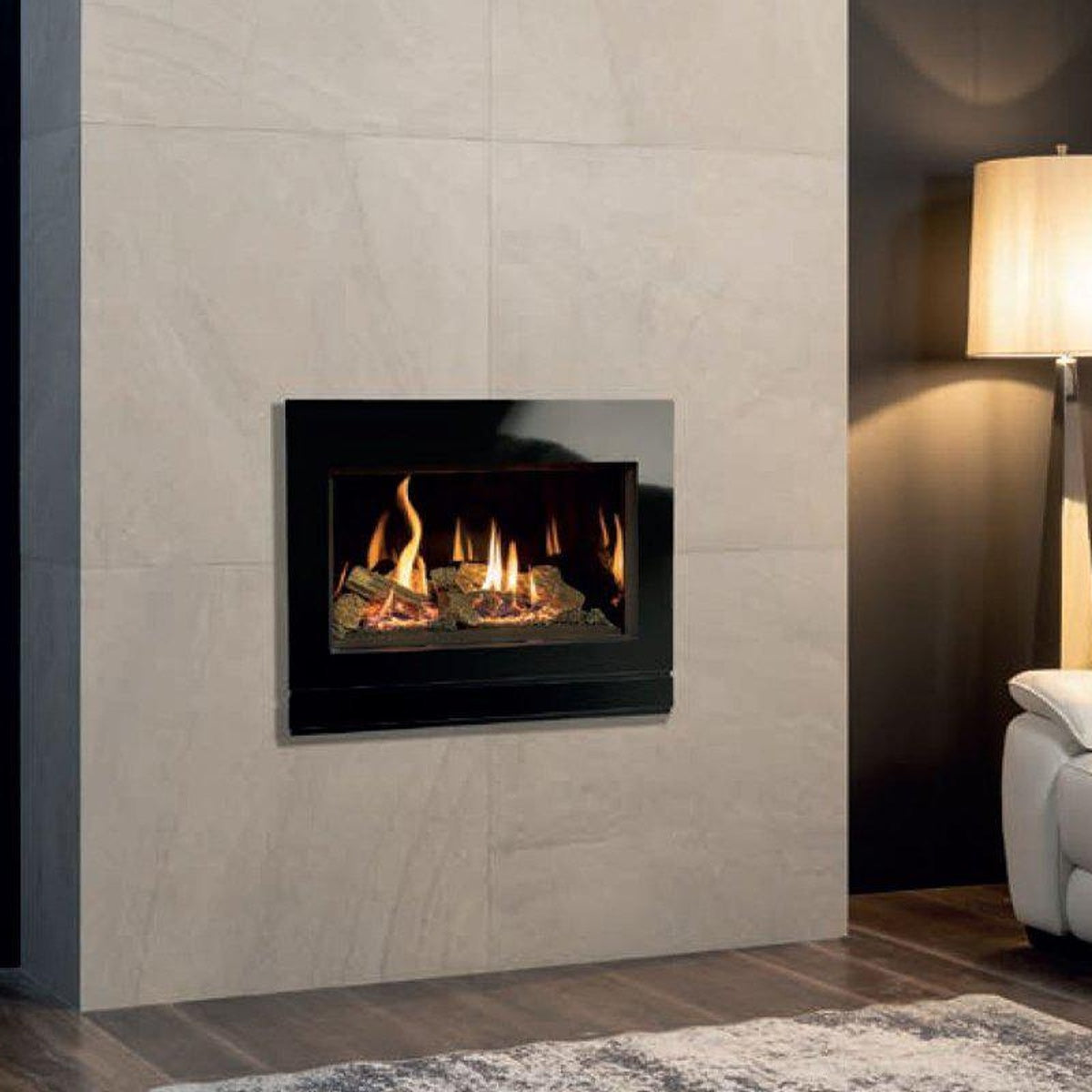 Gazco Riva2 600 Designio2 Black Glass gas fire with black glass lining, shown in a living room