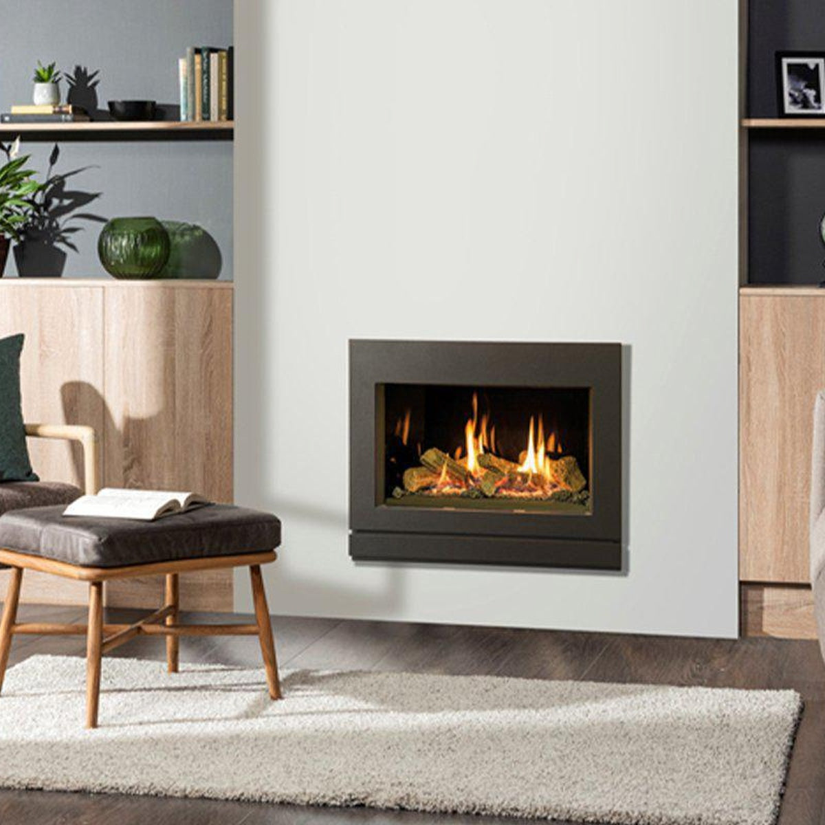 Gazco Riva2 600 Designio2 Graphite Steel gas fire with black glass lining, shown in a living room