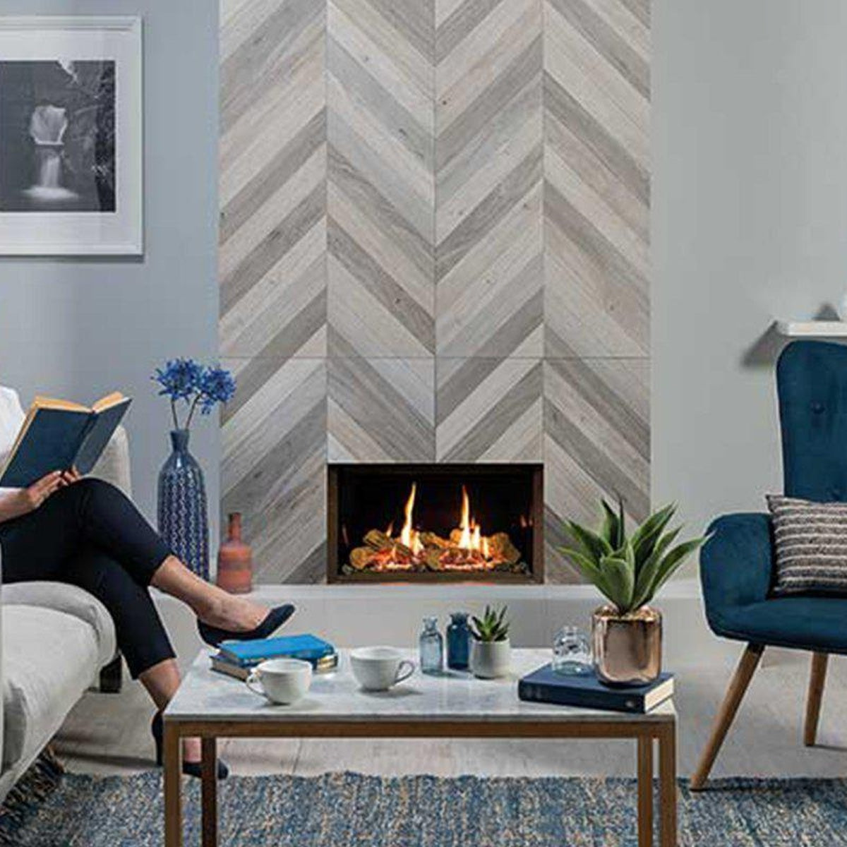 Gazco Riva2 600 Edge gas fire with black glass lining, shown in a living room