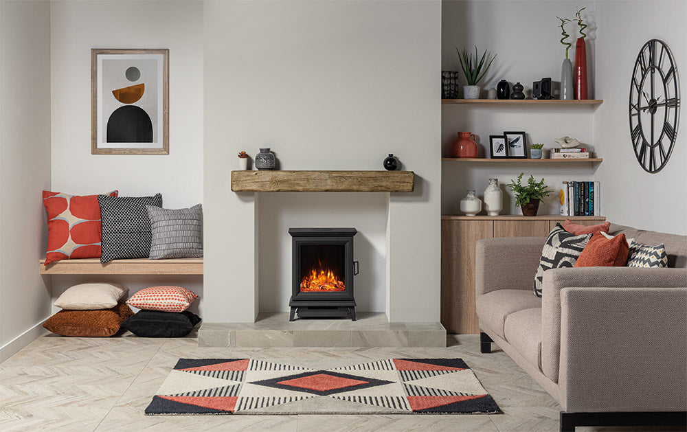 Gazco Sheraton 5 electric stove with a Crystal-Ice effect beneath a timber mantel