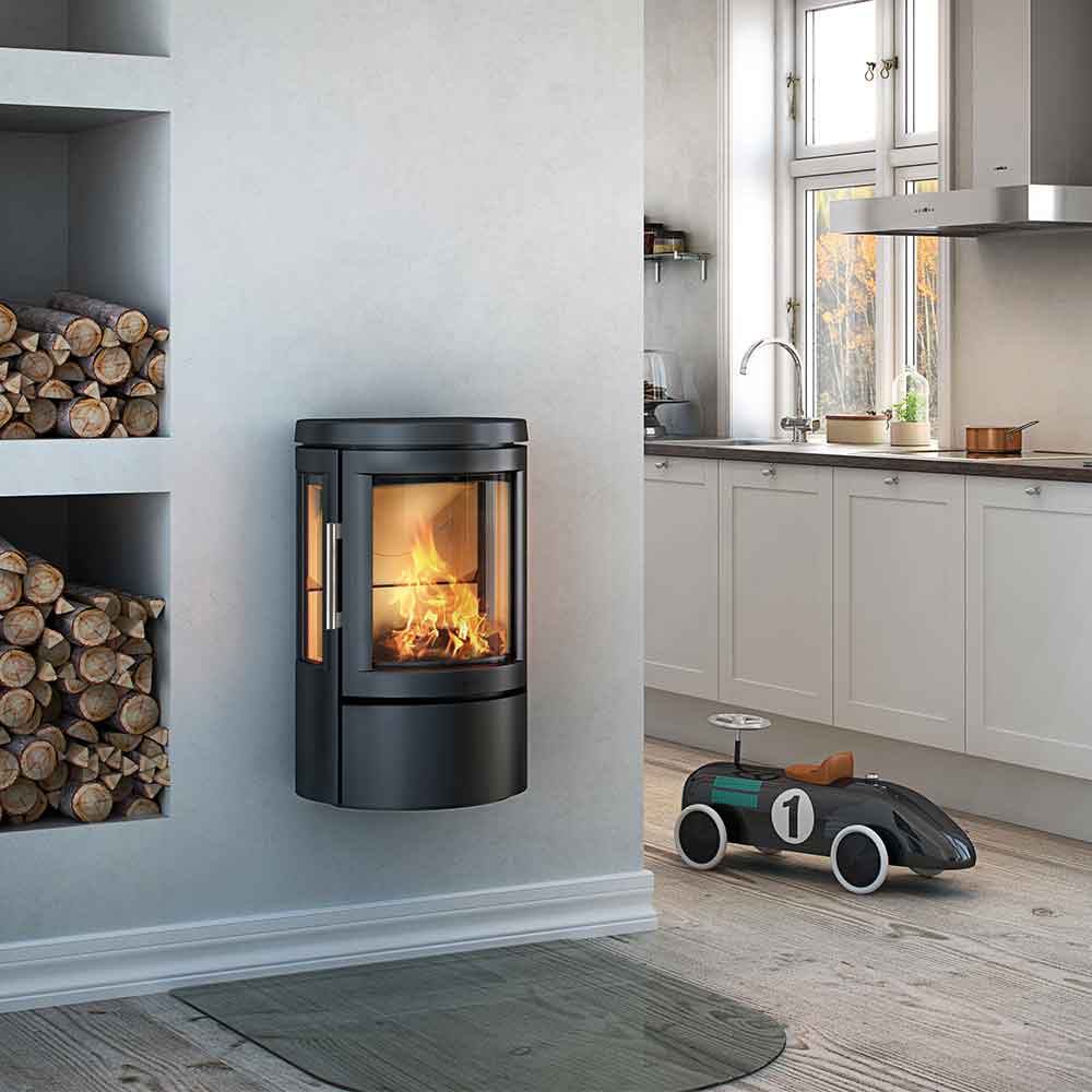 HWAM 2610c wood-burning stove in a room setting