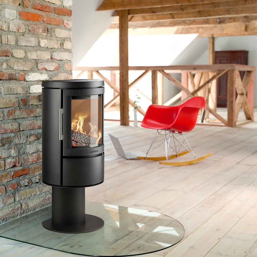 HWAM 2620c wood-burning stove in a room setting