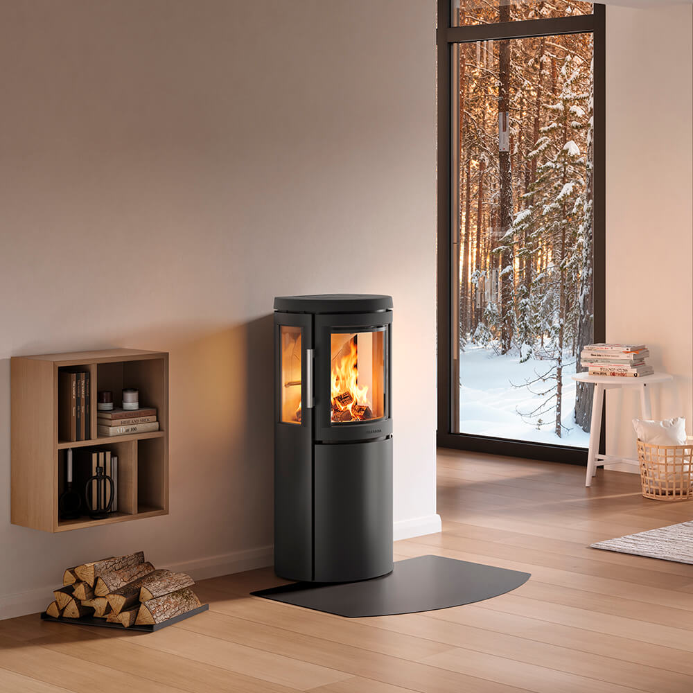 HWAM 2630c wood-burning stove in a room setting