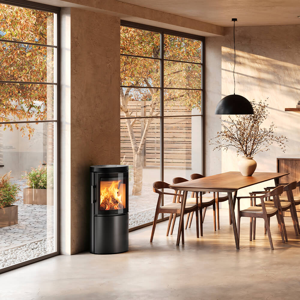 HWAM 3120m wood-burning stove with Modern door in a room setting