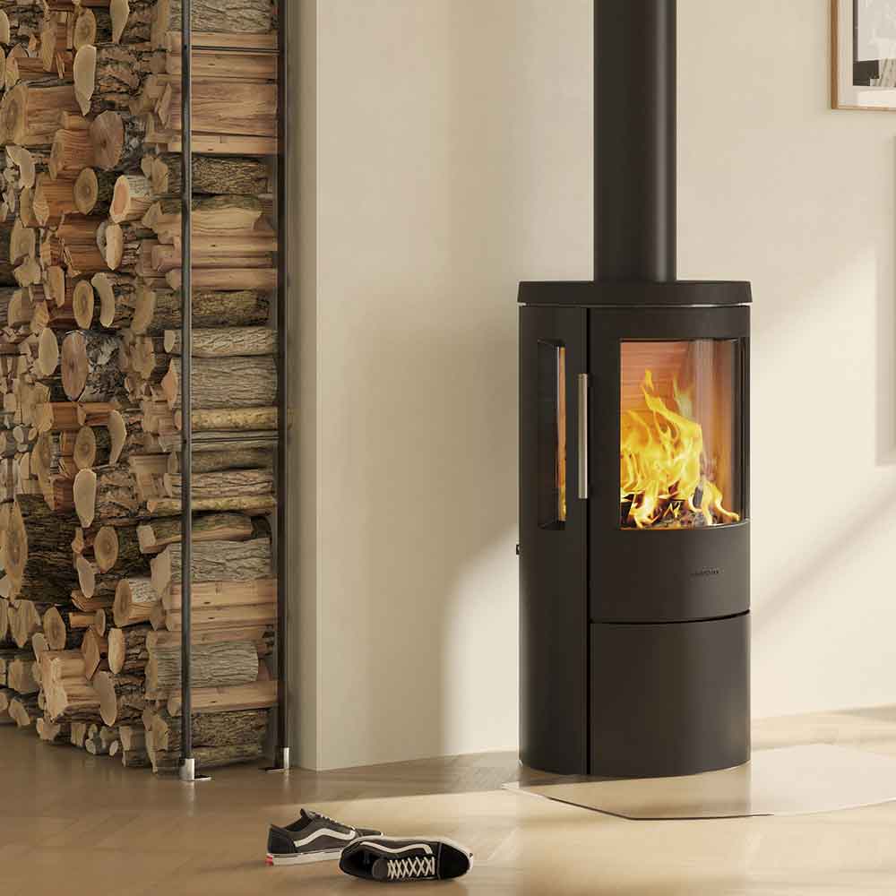 HWAM 3630c wood-burning stove in a room setting
