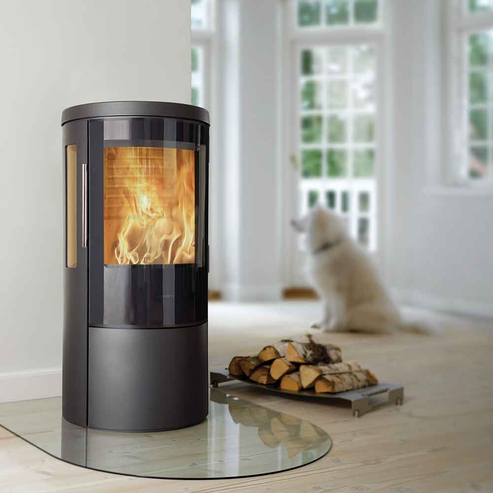HWAM 3630m wood-burning stove in a room setting