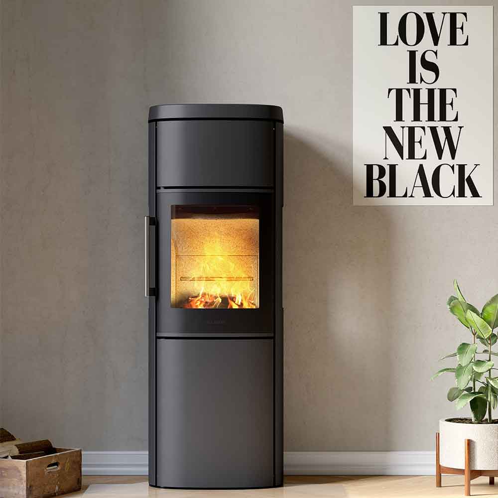 HWAM 4550m wood-burning stove in a room setting
