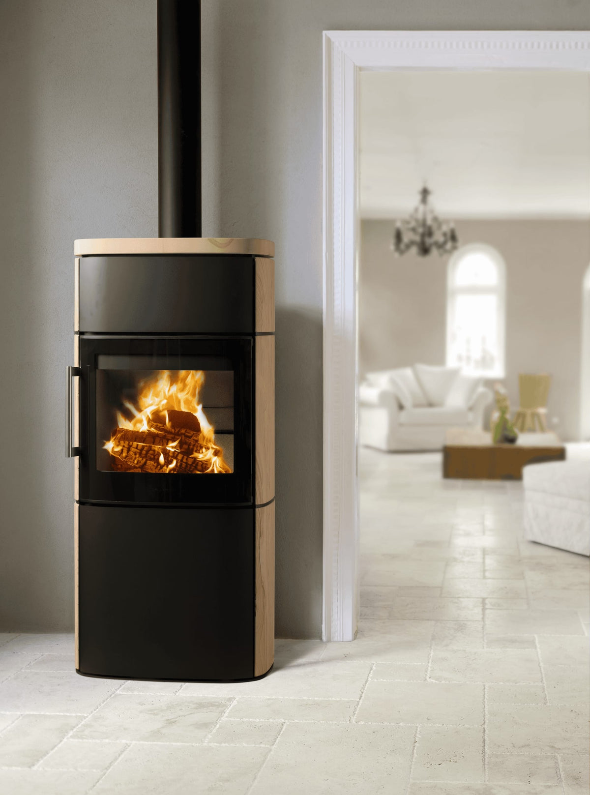 HWAM 4660 wood-burning stove with stone cladding in a bright white room