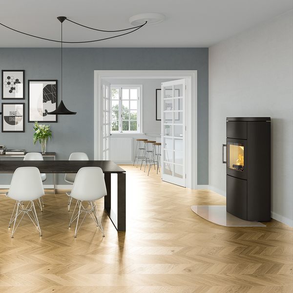 HWAM 4660c wood-burning stove in a room setting