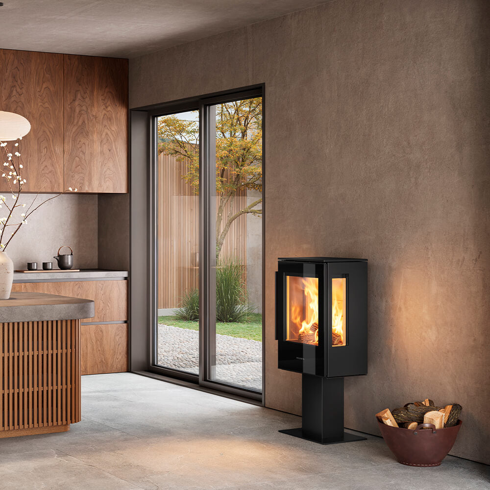 HWAM 5210m wood-burning stove in a room setting