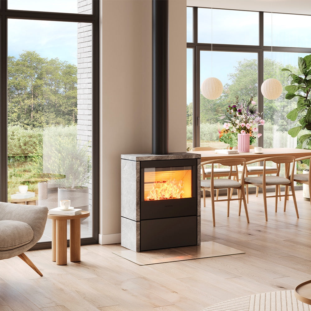 HWAM 5440c wood-burning stove in a room setting