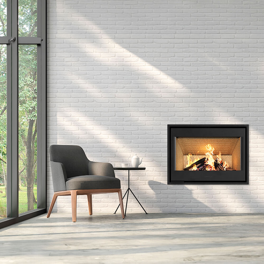 HWAM I 40/55c wood-burning stove in a room setting