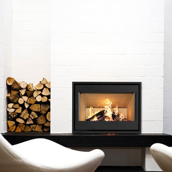 HWAM I 40/55c wood-burning stove in a room setting