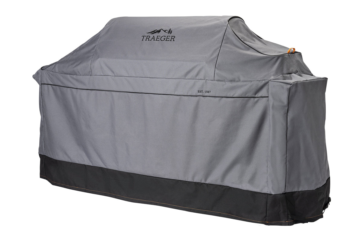 Traeger Ironwood XL grill cover viewed at an angle, showing the fitted side panel